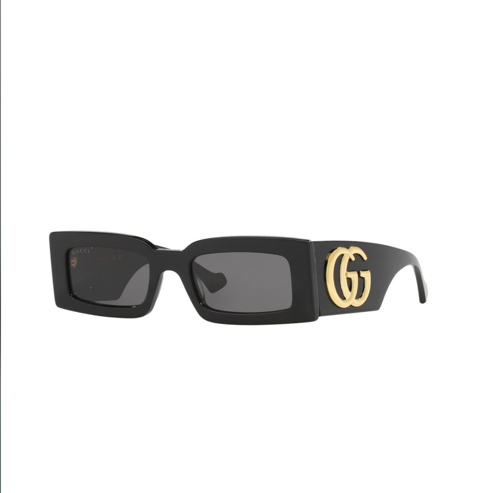 Gucci sunglasses.  Black with black lense